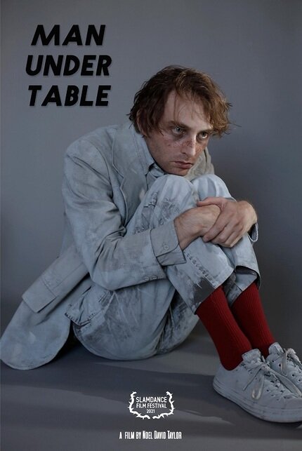 Man Under Table